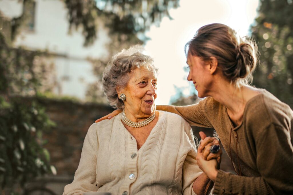 During an internship, a young woman works with an older women to assist her with everyday activities.